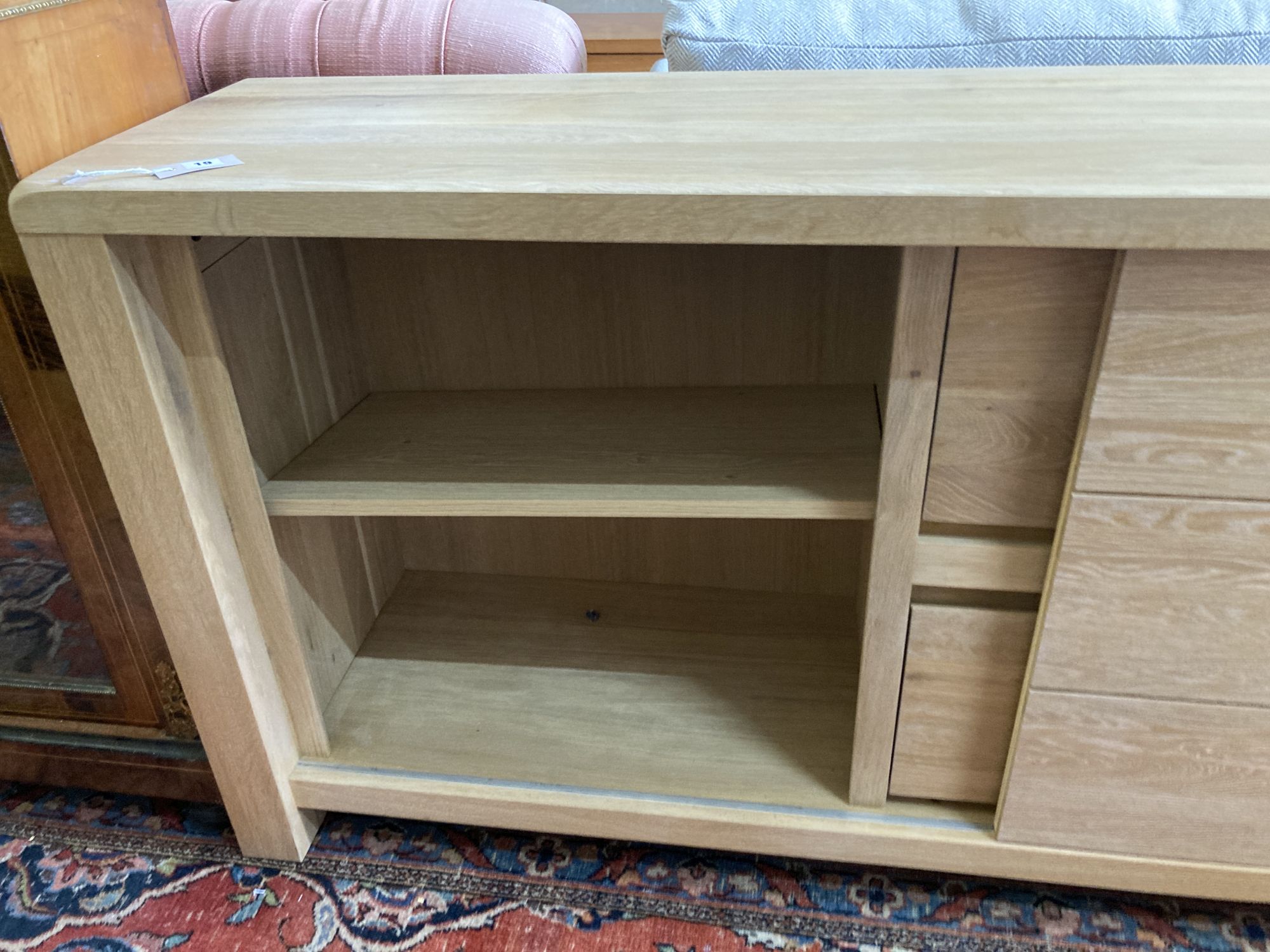 A modern contemporary oak sideboard, length 220cm, depth 45cm, height 85cm